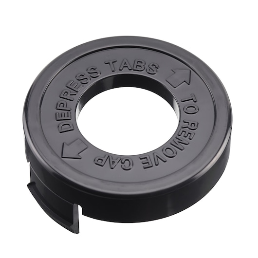 A black circular plastic cap with a hole in the center. The cap has embossed instructions reading 'DEPRESS TABS TO REMOVE CAP' with arrows pointing in opposite directions.