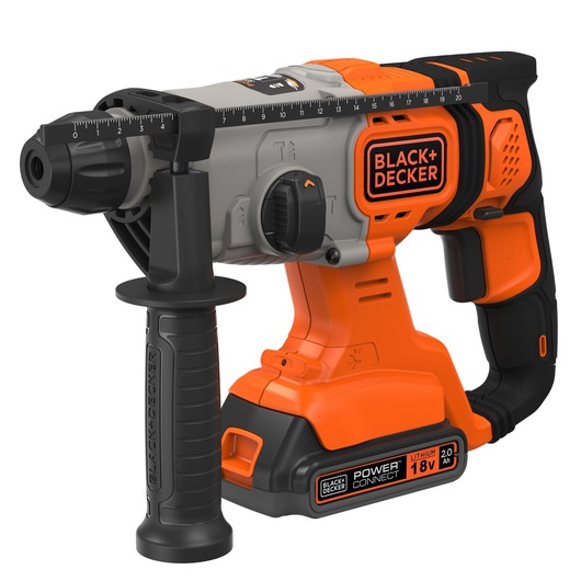 A BLACK+DECKER cordless rotary hammer drill with an 18V lithium battery. The tool is orange, black, and gray, features a side handle for stability, and has measurement markings along the top for precision drilling.