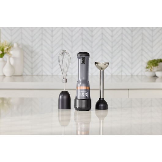 BLACK+DECKER BCKM1012KG hand blender set with whisk and blending attachment on kitchen counter.