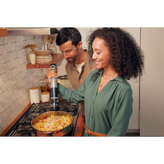 BLACKDECKER BCKM101SPFF cordless kitchen mixer used to prepare pasta in home kitchen.
