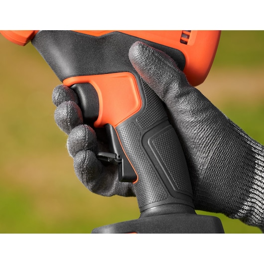 Close-up photo of BLACKDECKER power tool handle, SKU BCPP18D1, with textured grip held by gloved hand.
