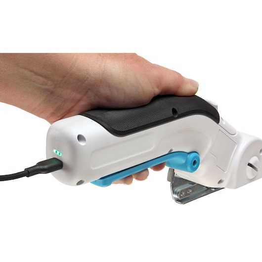 BLACKDECKER BCRC115 photography of a handheld power tool with black grip, blue trigger, and charging cable connected, side view.