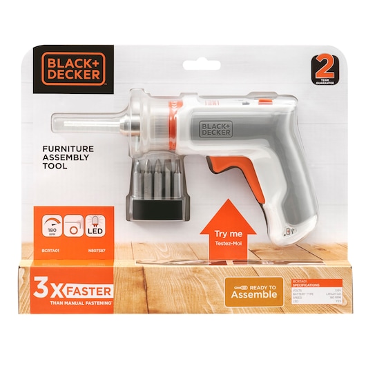 BLACK+DECKER furniture assembly tool in retail packaging, featuring a compact electric screwdriver with multiple bits and LED light. Packaging highlights 2-year guarantee, 180 RPM speed, and claims it is 3 times faster than manual fastening, ready to assemble.