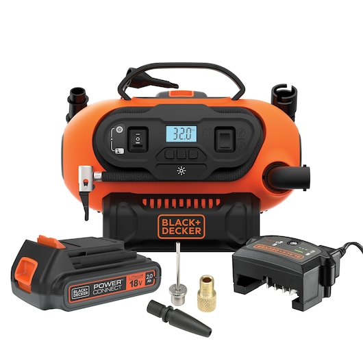 A BLACK+DECKER portable air compressor with digital display, 18V lithium battery, charger, and several air nozzle adapters, all placed on a white background.