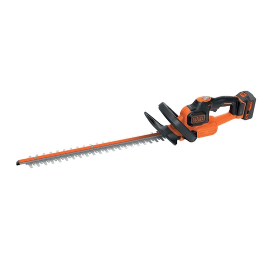 BLACKDECKER GTC18504PC orange cordless hedge trimmer, side angle on white background.